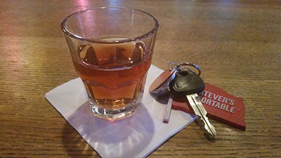 picture of car keys and glass of alcohol